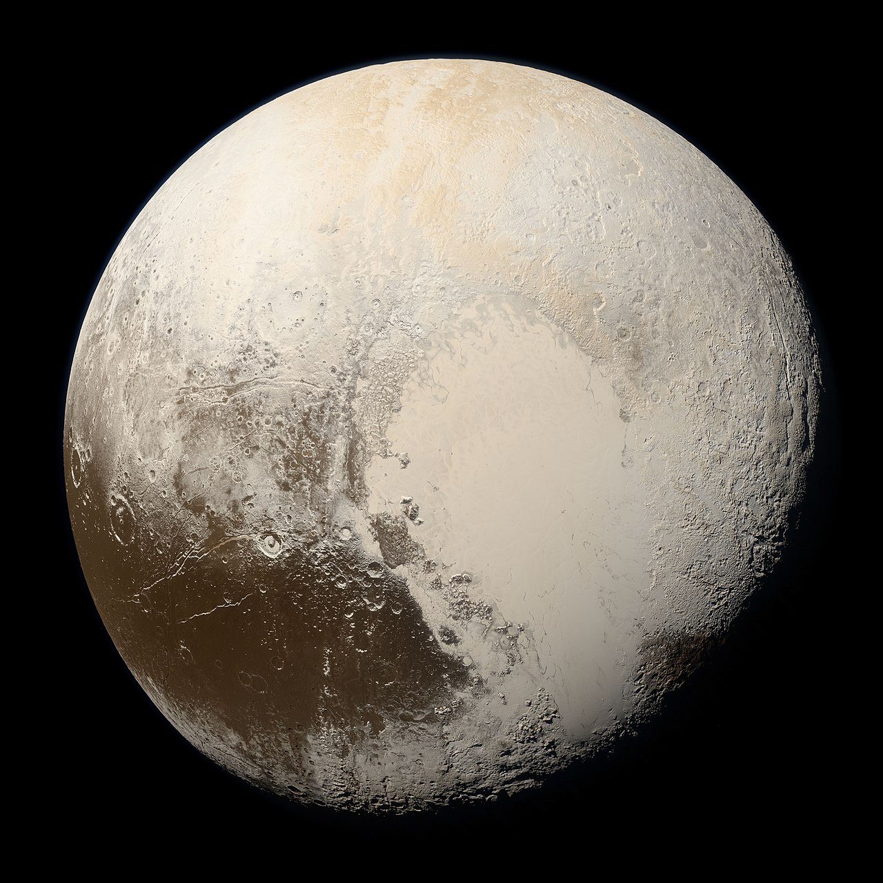 Pluto in true colour as photographed by the New Horizons spacecraft in July 2015, showing the pale heart-shaped Tombaugh Regio nitrogen ice plain and surrounding reddish-brown terrain